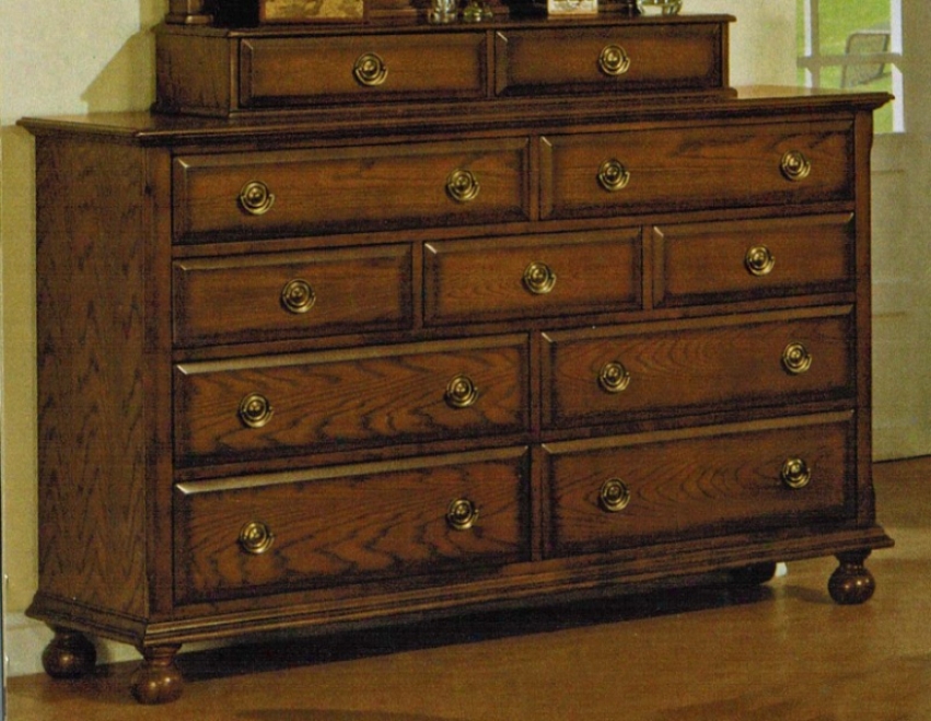 Dresser With Ring Handles In Mellow Oak Finish