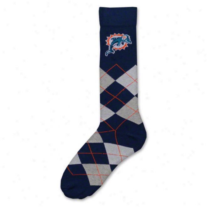 Miami Dolphins Adjust Socks